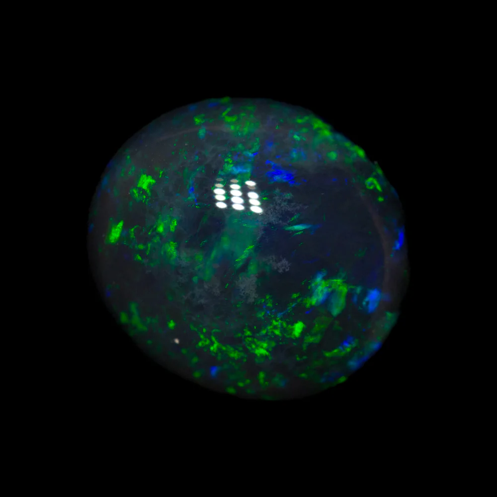 3.37 ct black opal 10.5x9.6x5.6mm
