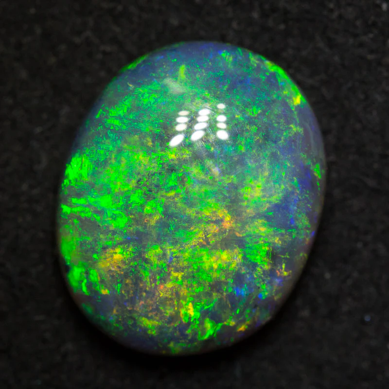 3.42 ct black opal 11.7x9.6x4.7mm