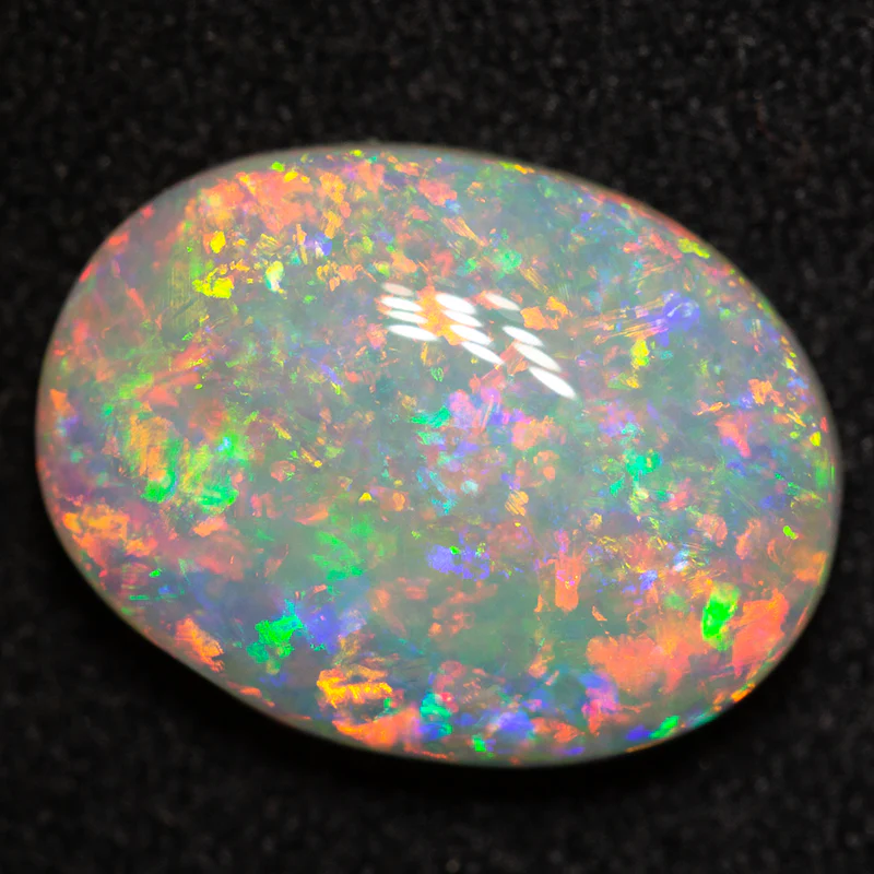 3.49 ct white opal 13x9.8x4.2mm