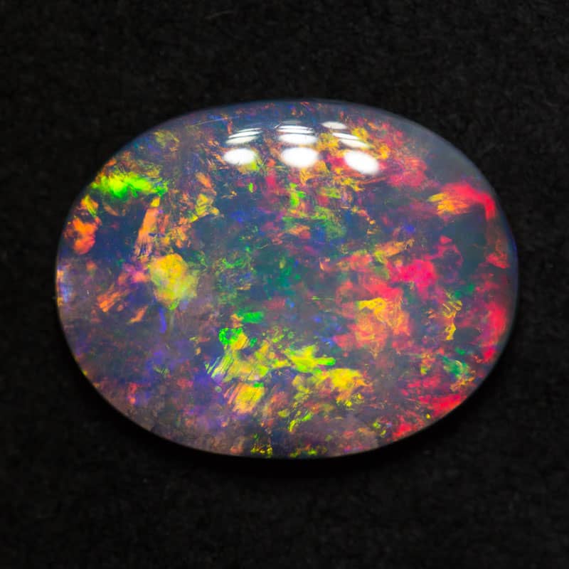 3.53 ct dark opal 14.4x11.2x3.4mm