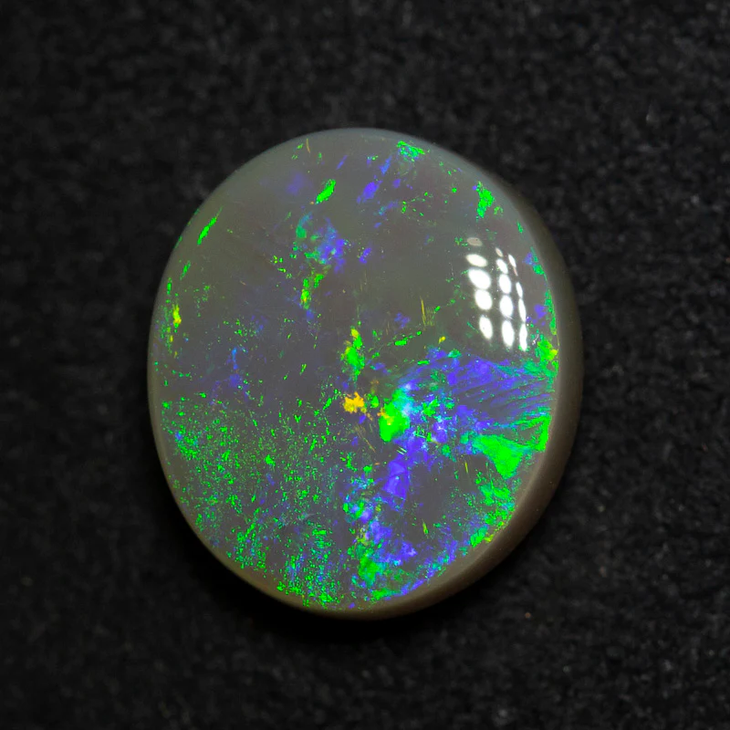 3.55 ct dark opal 11.1x9.9x5mm