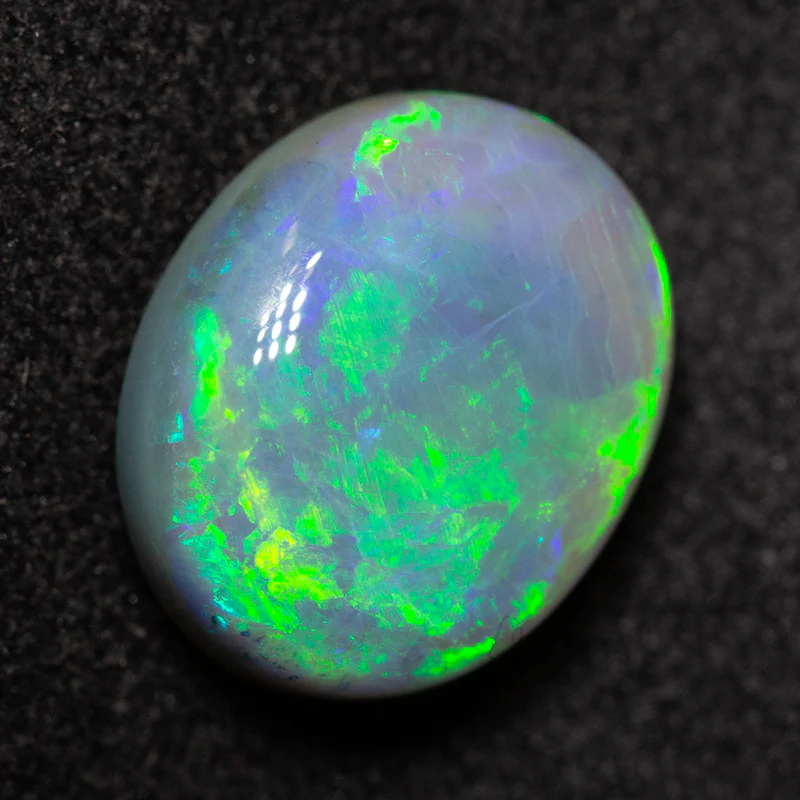 3.57 ct dark opal 11x9x5.3mm