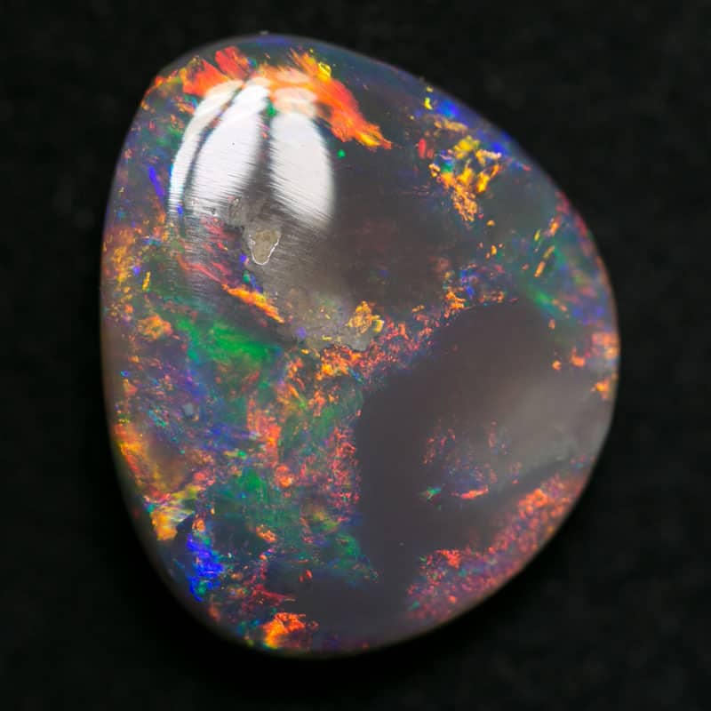 3.58 ct dark opal 131x11x4mm