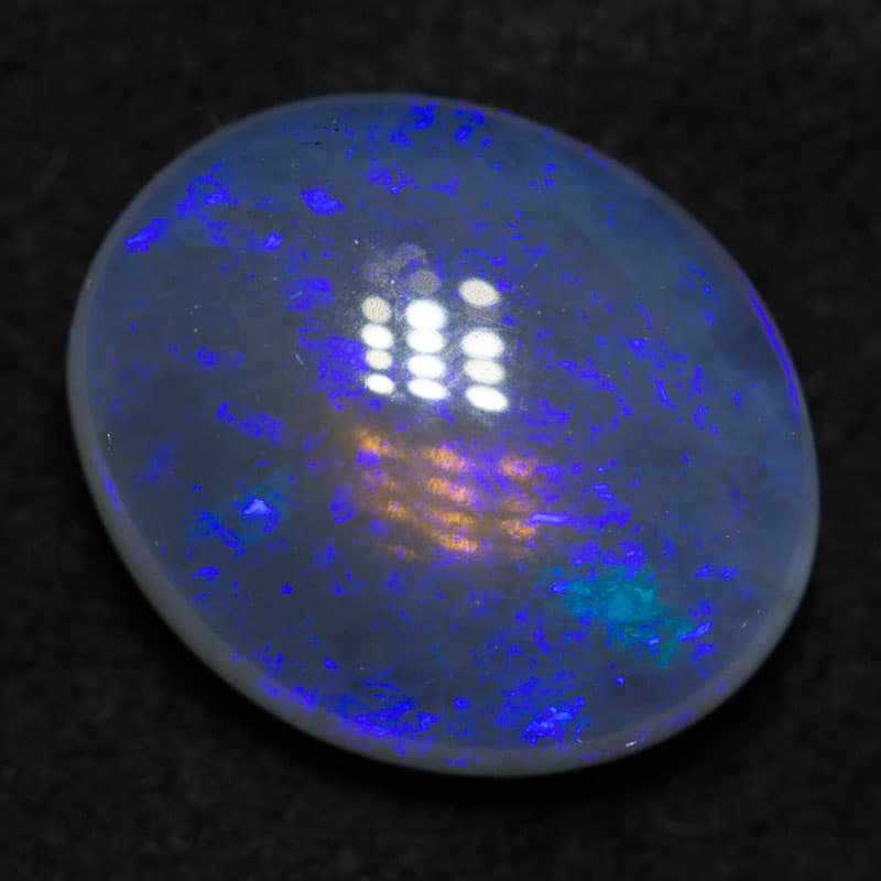 3.61 ct black crystal opal 12.2x10.2x4.7mm