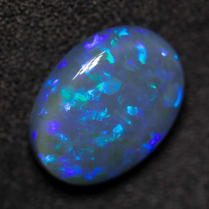 3.64 ct black opal 12.7x9.6x5.1mm