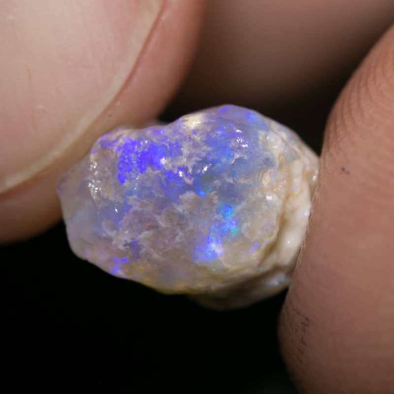 3.67 ct roughly rubbed opal piece 10mm across