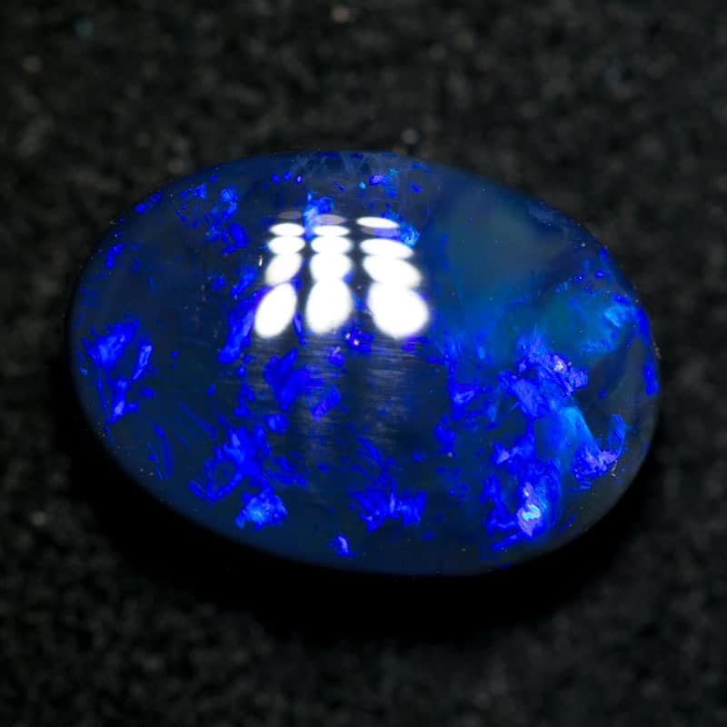 3.75 ct black opal 12x9x5mm