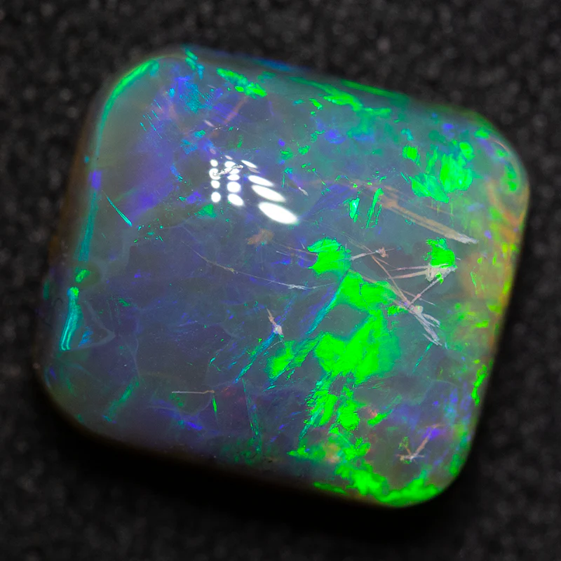 3.79 ct black crystal opal 9.7x8.8x5.6mm