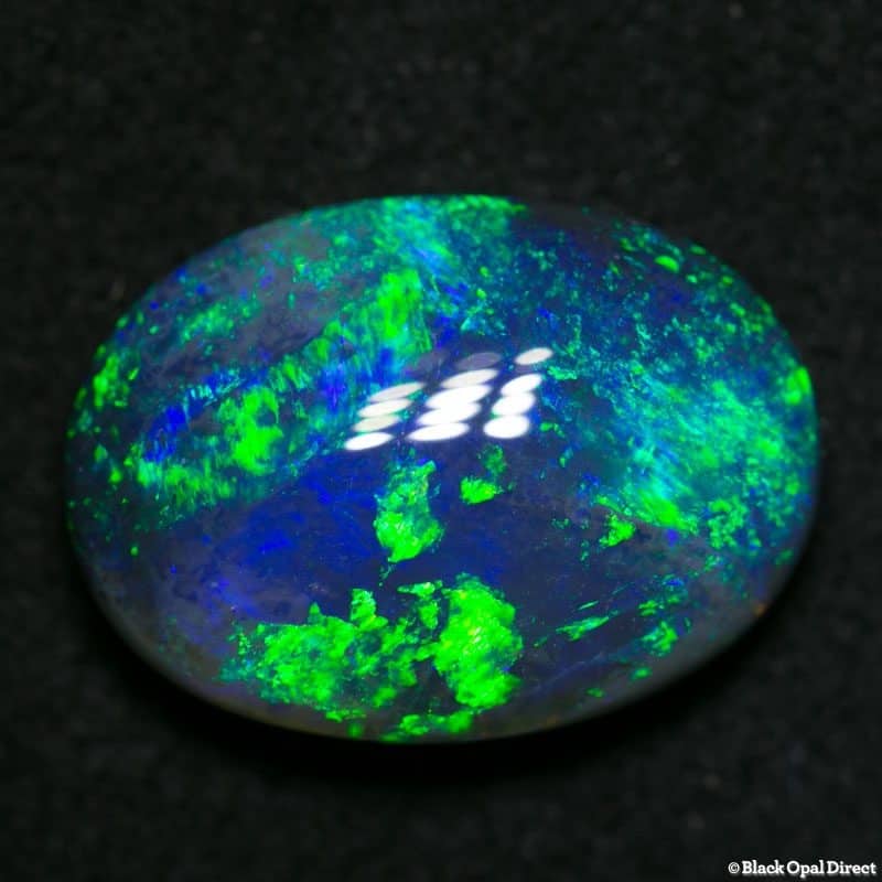 3.90 ct double sided black opal gem 13.5x10x4.5mm