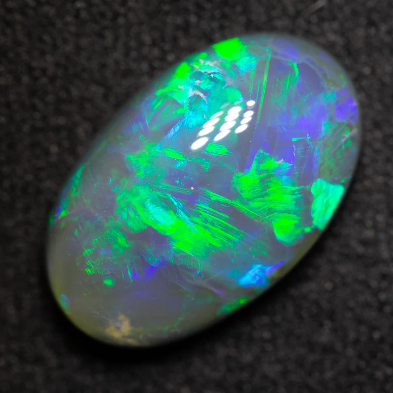 3.97 ct black opal 13.7x8.6x5.3mm