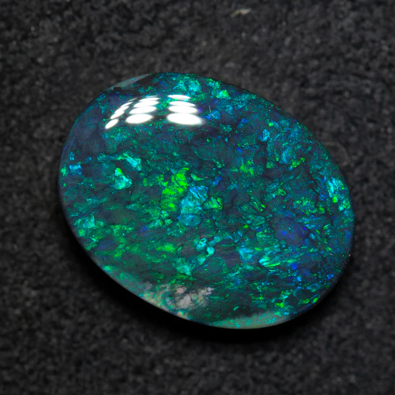 3.98 ct double-sided black opal 12.8x9.7x4.4mm