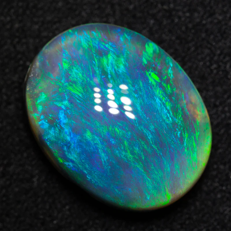 3.99 ct black opal 13.1x10.3x4.9mm