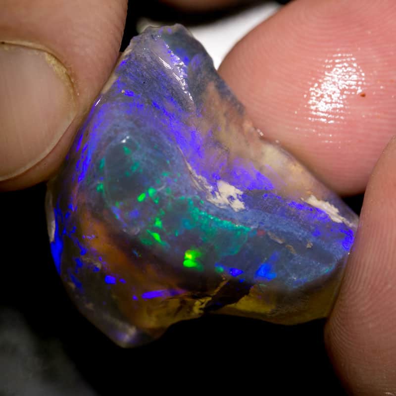 36.19 ct roughly rubbed opal piece 27mm across