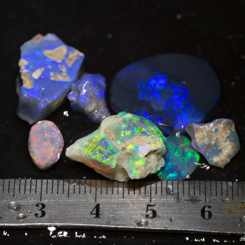 38 ct rough &rubbed opal parcel 7pc