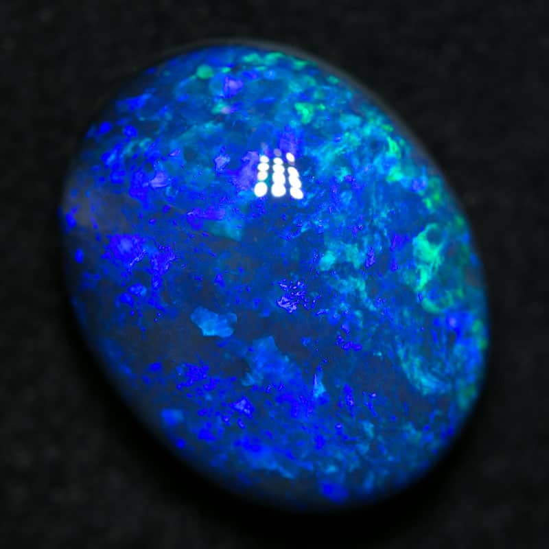 4.02 ct black opal 12x10x5.5mm