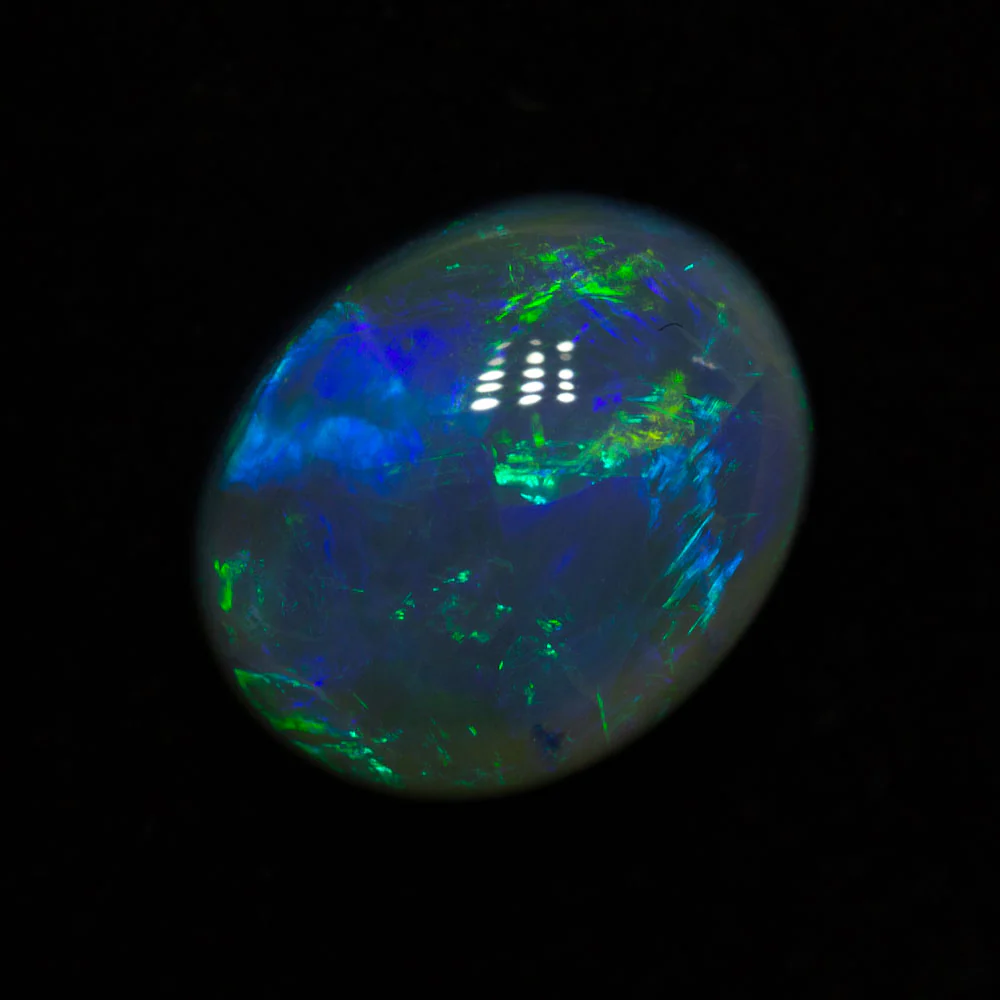 4.09 ct black opal 11.4x9.3x6mm - Image 2