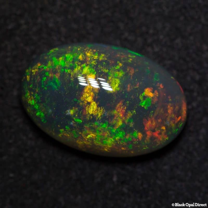 4.10 ct black crystal opal 14x9x4.5mm