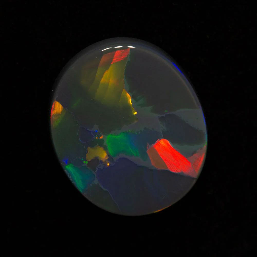 4.15 ct black opal 13.4x11.6x3.7mm