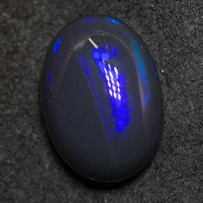 4.24 ct black opal 12.9x9.2x5.4mm
