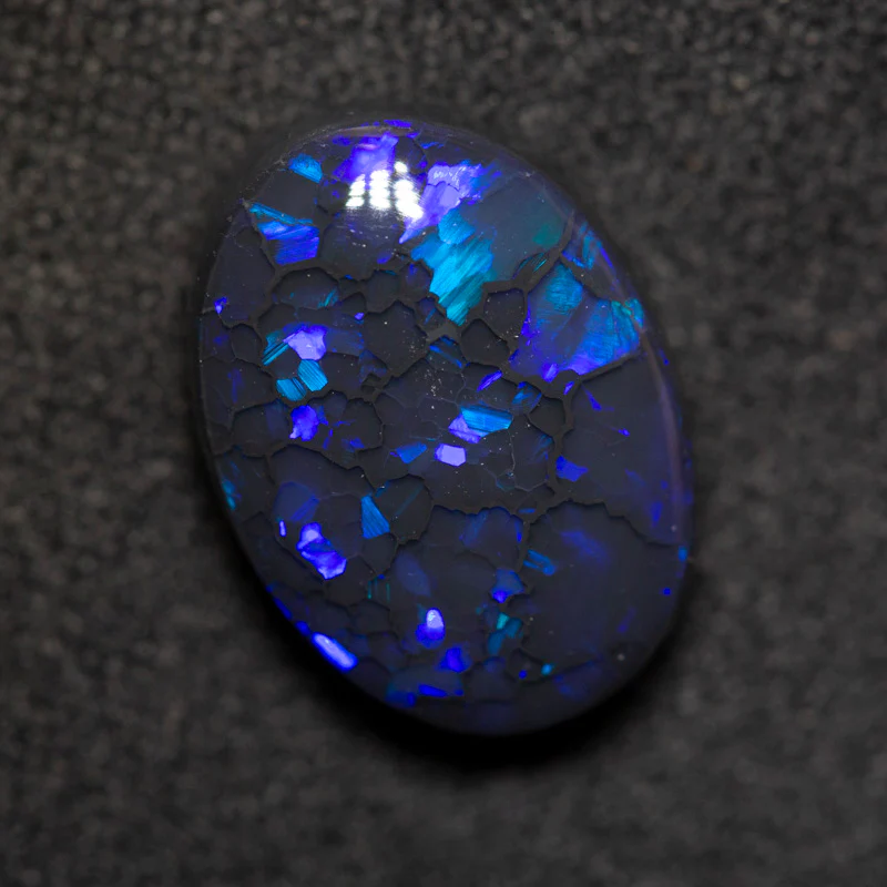 4.27 ct black opal 13.2x9.5x5.2mm