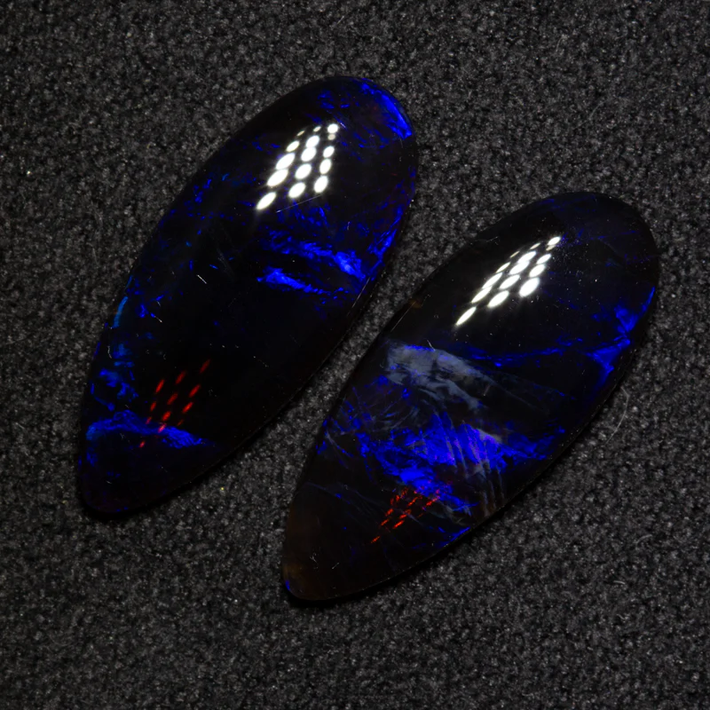4.28 ct black opal pair 16.8x7.2x2.7mm