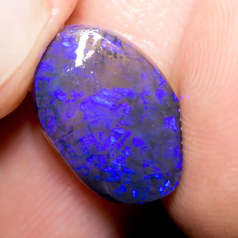 4.30 ct roughly rubbed opal piece 15mm across