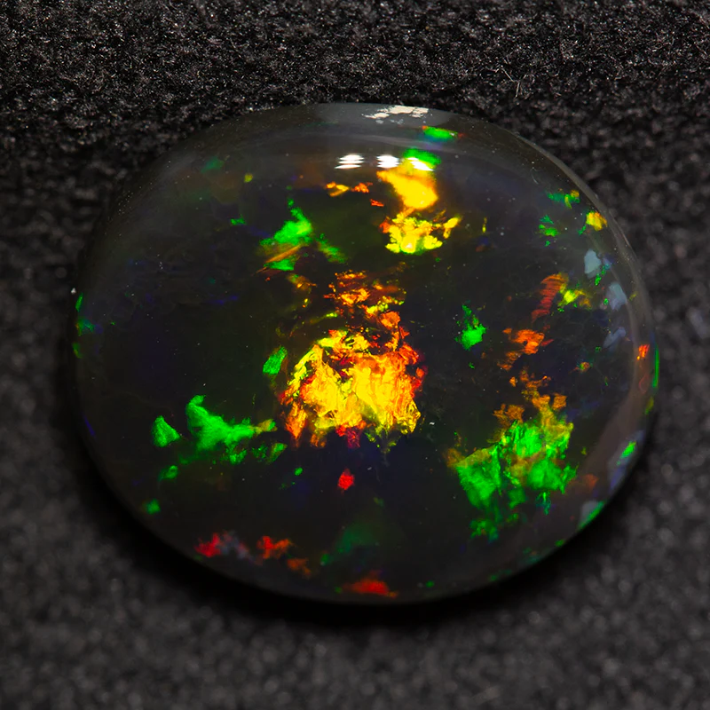 4.32 ct black opal 12.5x11x4.5 mm