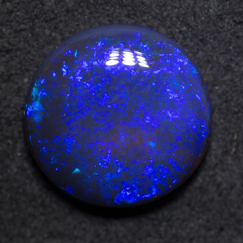 4.37ct black opal 12.9x12.7x4.1mm
