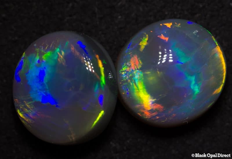 4.44 ct semi black gem opal pair 9x8.5mm including appraisal