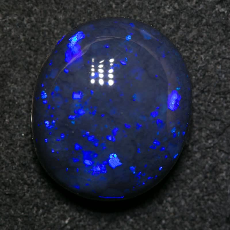 4.56 ct black opal 12.5x11x6mm