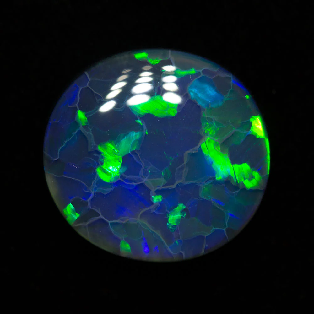 4.66 ct black opal 12.4x11.6x5mm - Image 2