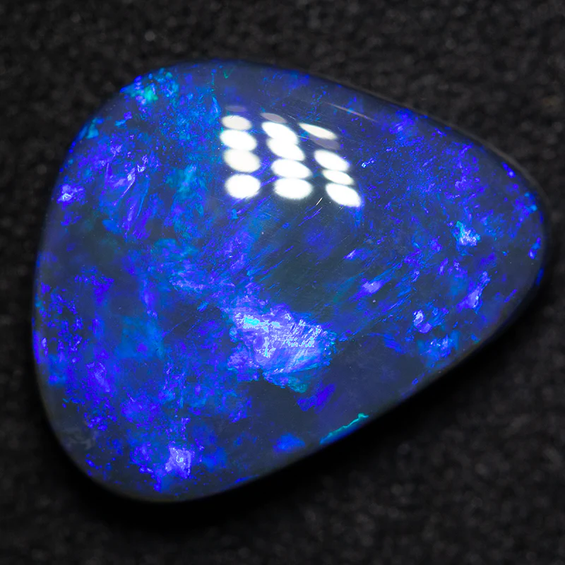 4.77 ct black opal 14x12x5mm