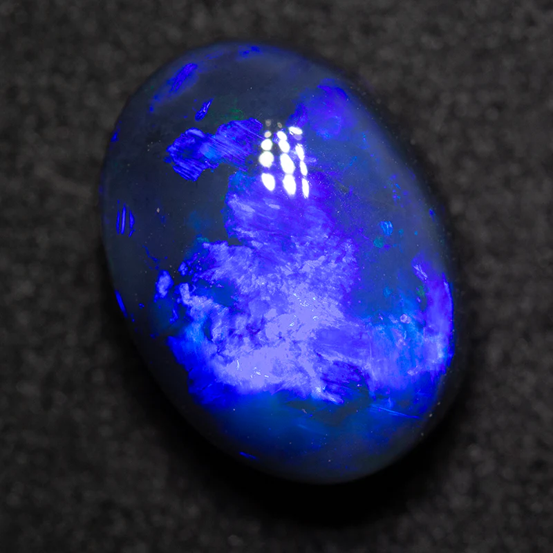 4.80 ct black opal 12.1x8.9x6.9mm