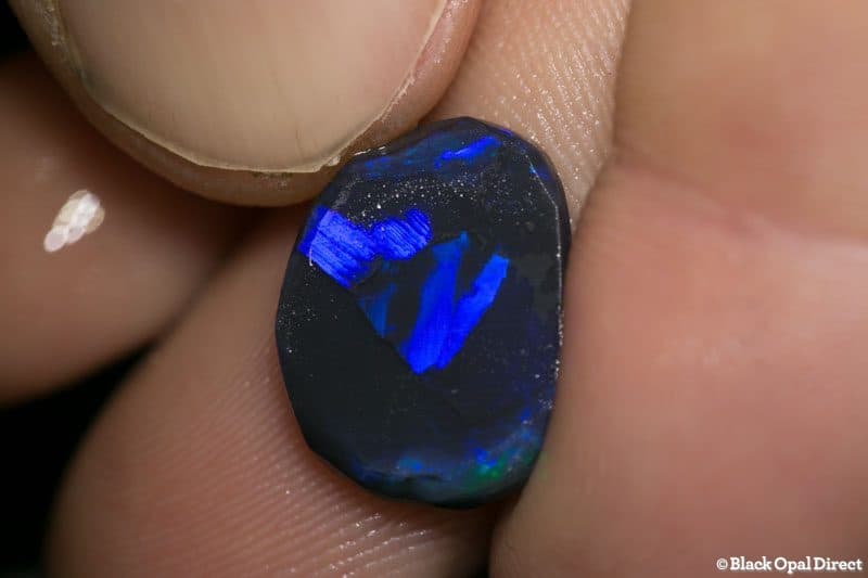 4.90 ct rubbed opal piece 16mm across