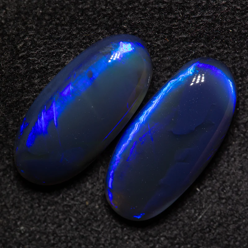 4.98 ct black opal pair 13.5x6.3x4.1mm