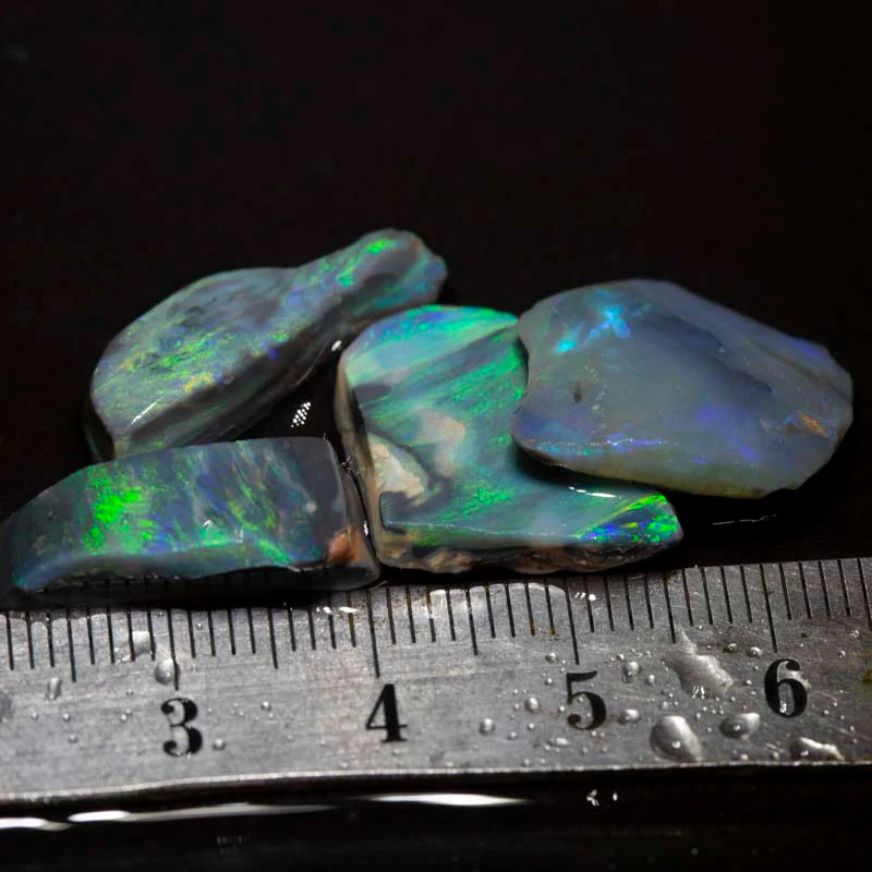 47.00 ct rough & rubbed opal parcel 4pc
