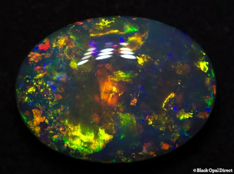 5.06 ct semi black gem opal 14.5x11x5mm