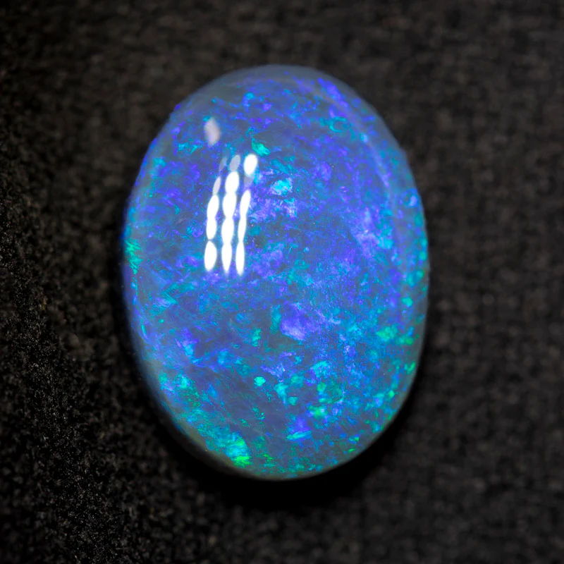 5.20 ct black opal 13.8x10.3x5.7mm