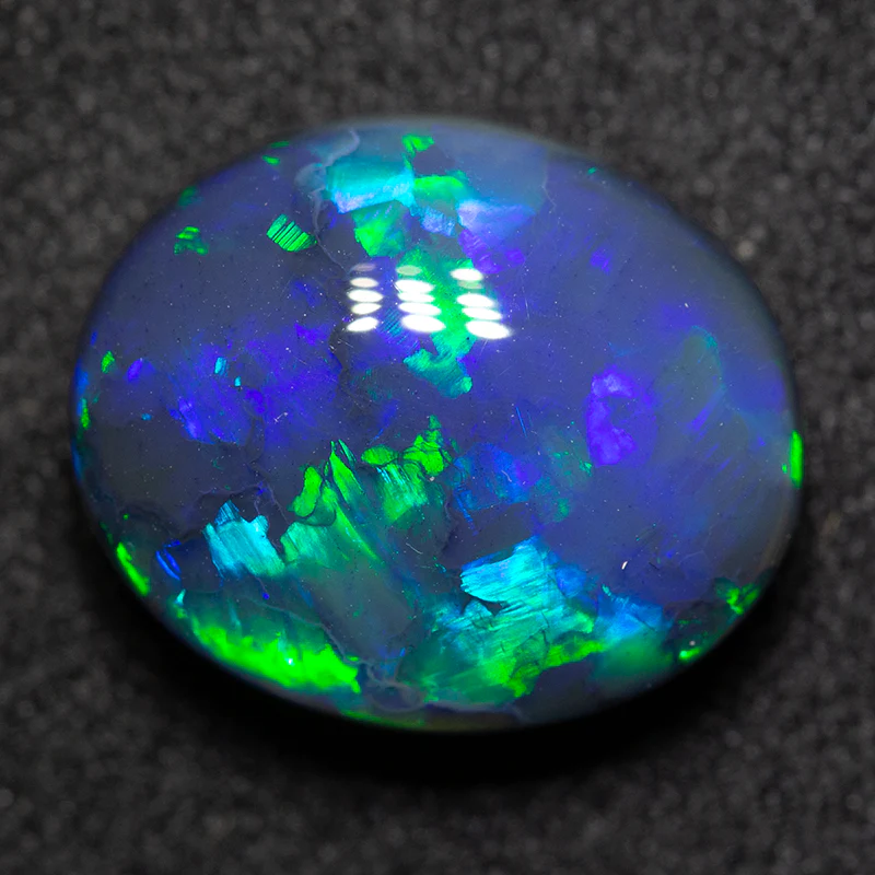 5.29 ct black opal 12.7x10.6x6.1mm