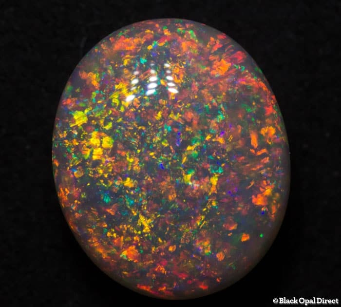 5.36 ct double sided crystal opal 12x10x7mm