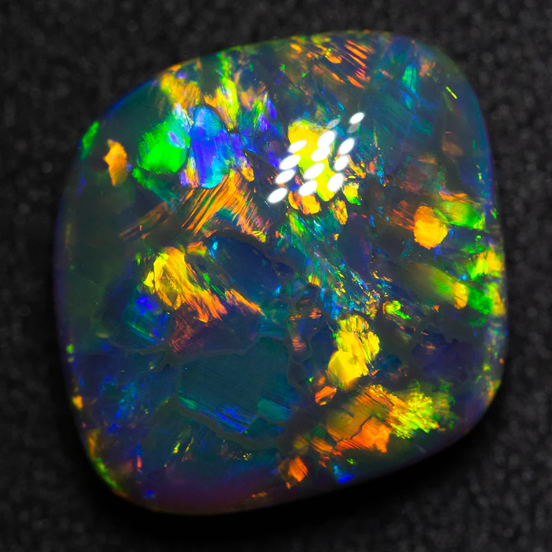 5.46 ct black opal 14x12.4x5.8mm