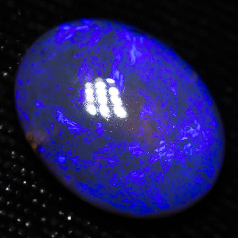 5.59 ct black opal 14x12x6mm