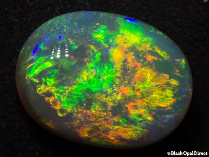 5.59 ct double sided crystal opal 14x11x5mm