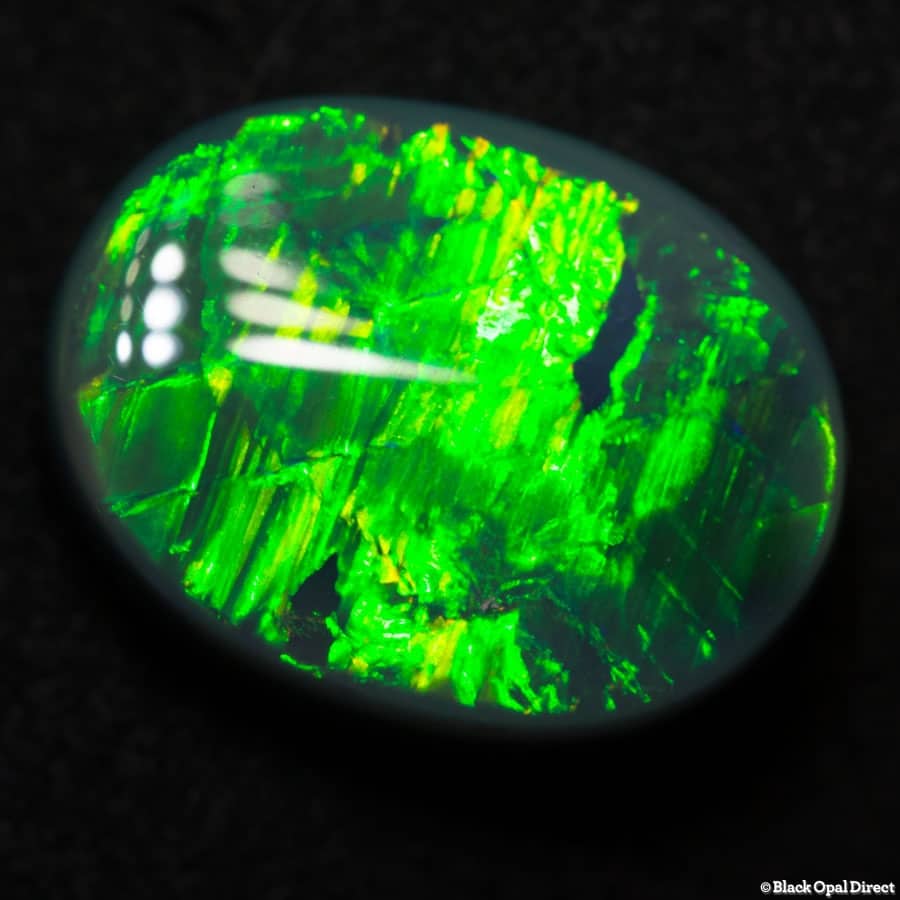 5.60 ct dark opal green gem 14x11x5mm