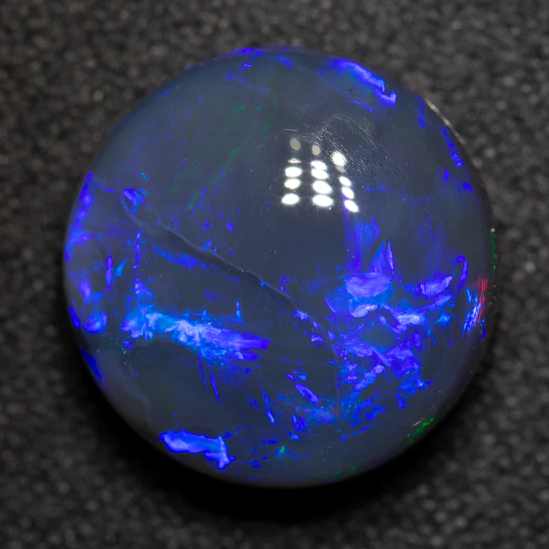 5.66 ct black opal 12.2x12x6.3mm