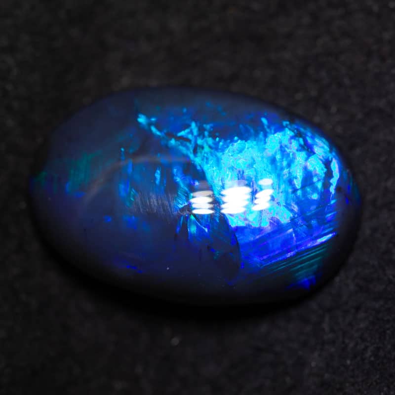 5.75 ct black opal double sided 15.6x10.3x5.7mm