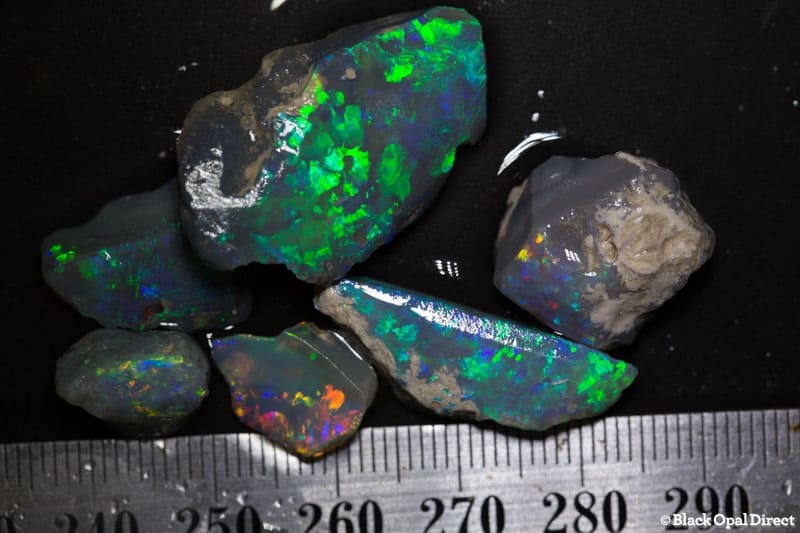 52.68 ct rough and rubbed opal parcel 6 pieces
