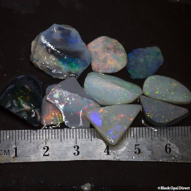 52 ct rough and rubbed opal parcel for intermediate opal cutters