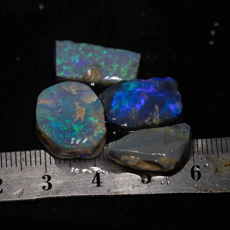 53.00 ct rough and rubbed opal parcel 4pc