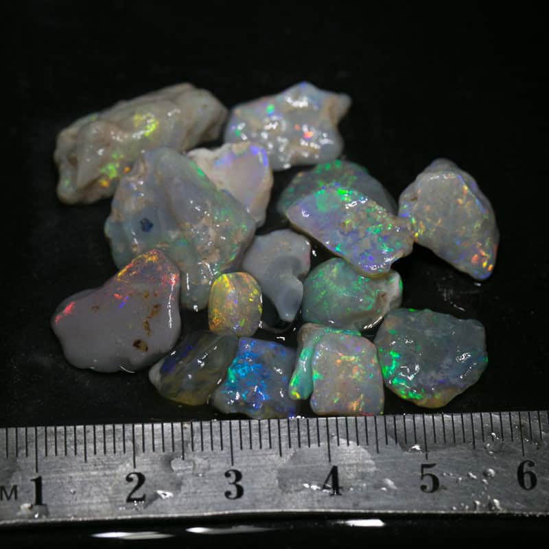 55 ct  16pc rough opal parcel for intermediate cutters